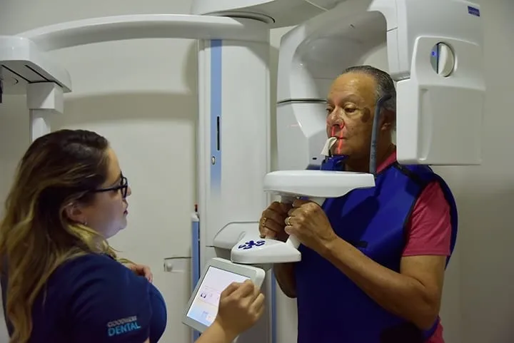 x-ray machine with woman being x-rayed 